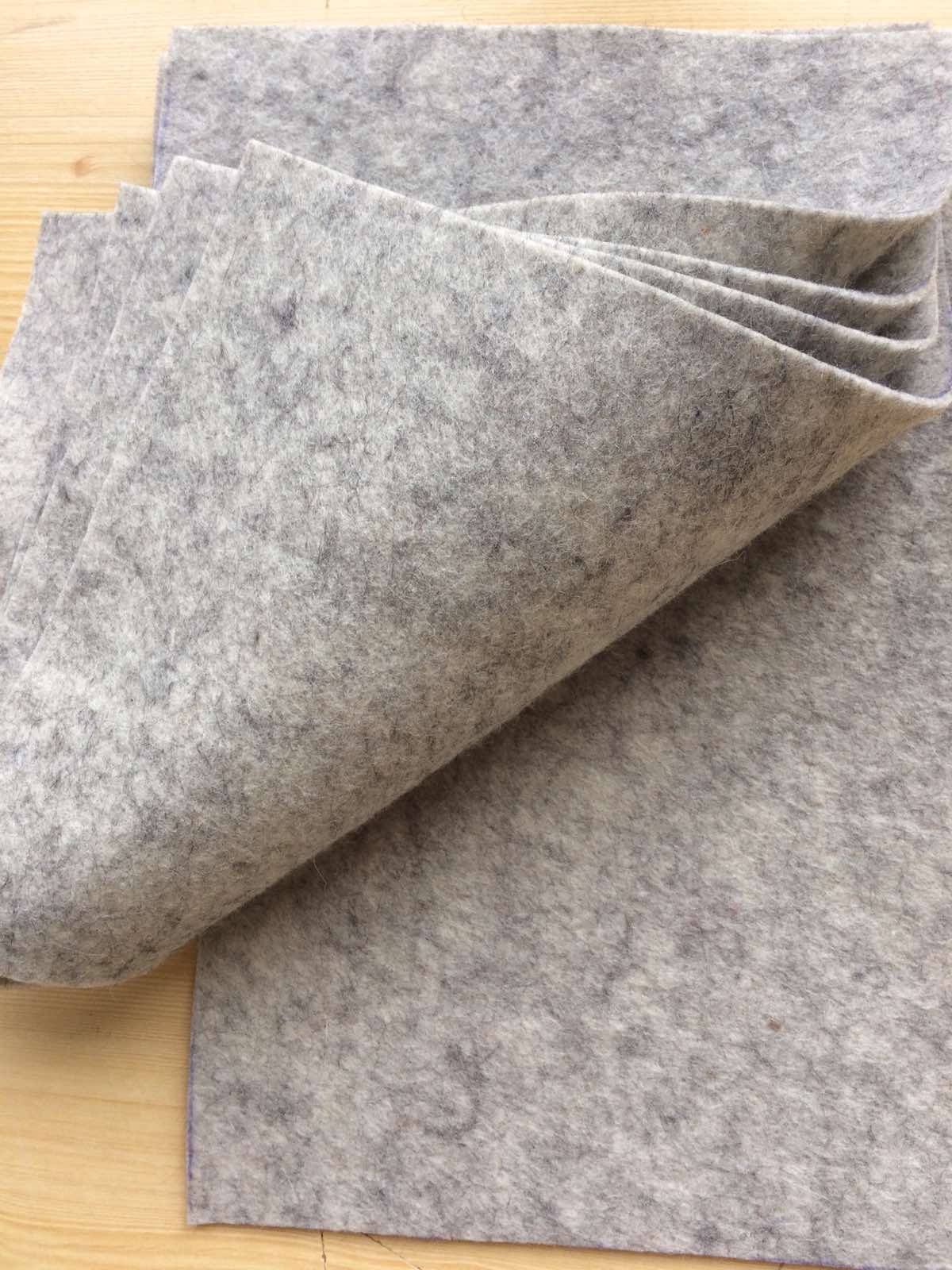 Grey melange colored woolfelt sheet, 100%